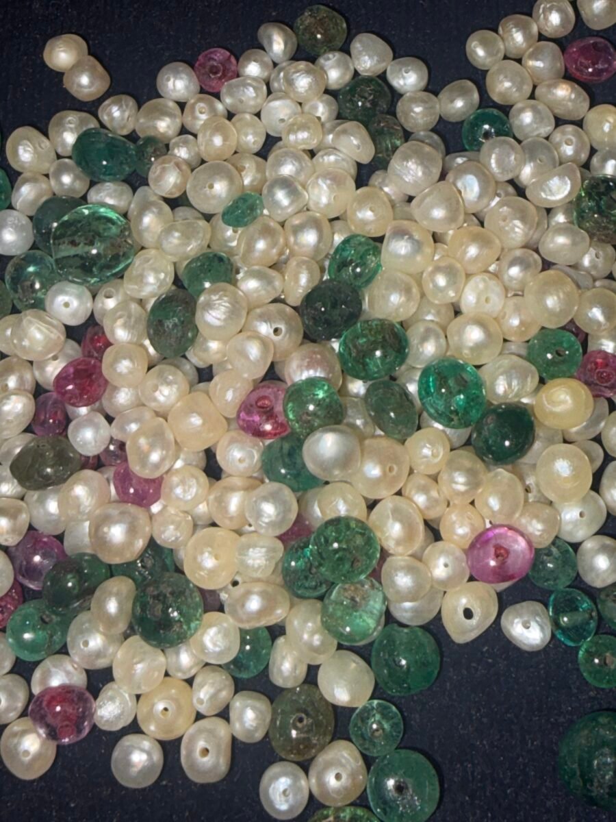 Loose Basra pearls with emerald and red beads