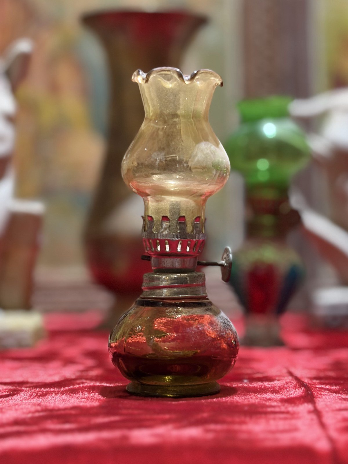 Miniature oil lamp with an amber glass chimney and base