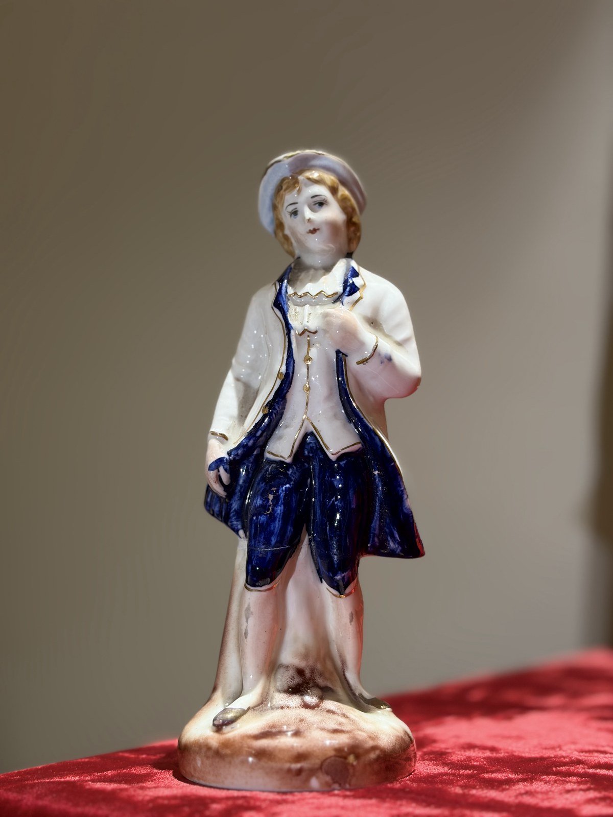 Glazed porcelain figurine of a gentleman, second view