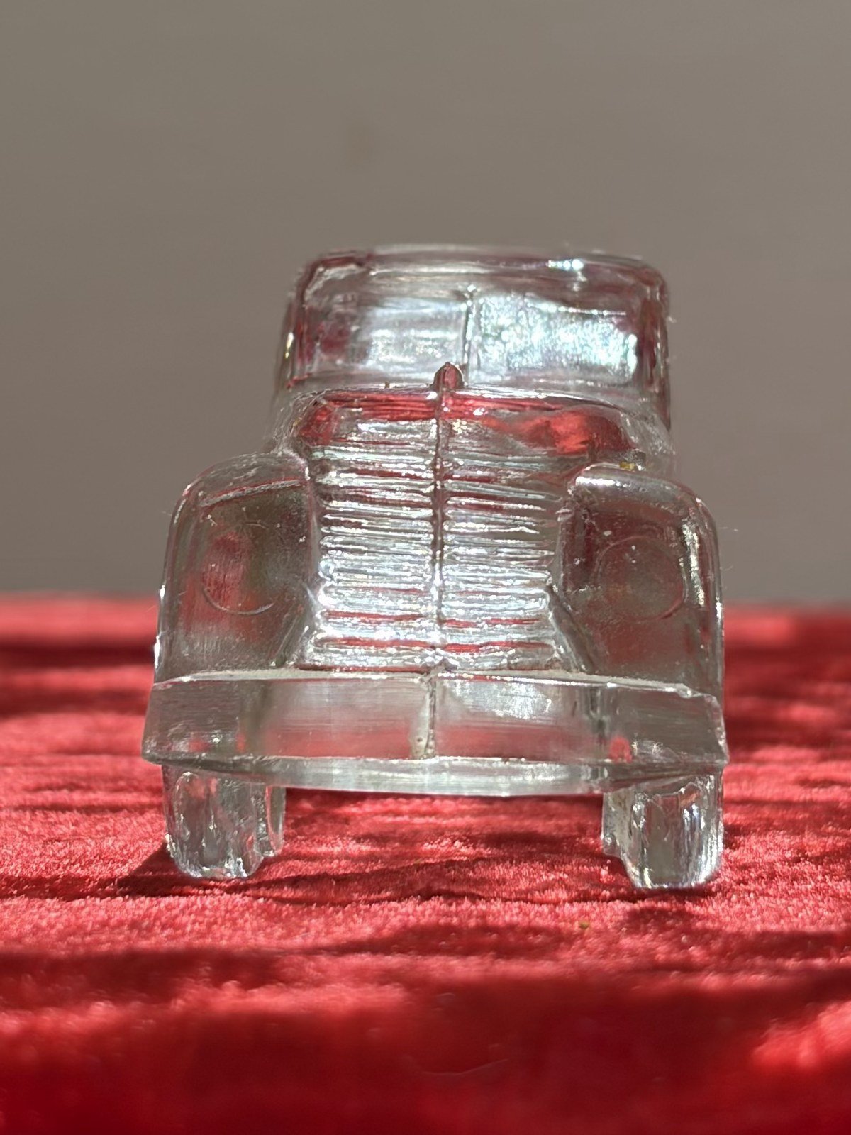 Pressed-glass model car, front view
